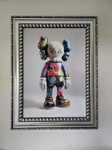 Graffiti Kaws Canvas Print in Silver Frame
